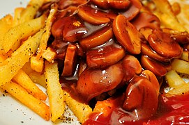 Mushroom gravy atop French fries