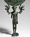 Jeune fille nue. Support de miroir. Bronze, Laconie, Sparte? 550-500. The Met[66]