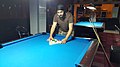 Image 4A player racking the balls (from Pool (cue sports))