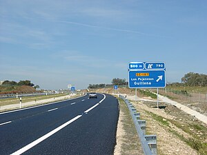Modern autovías (expressway) such as the A-66 near Guillena, Seville, offer most, if not all, features that are required by an autopista (motorway).