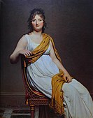 Madame Raymond de Verninac de Jacques-Louis David, cu îmbrăcămintea și scaunul în stilul Directoire. „Anul 7”: adică, 1798–1799