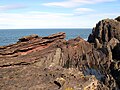 Siccar Point i Skotland er en berømt geologisk lokalitet.