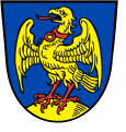 Gemeinde Oberaudorf In Blau auf goldenem Dreiberg stehend ein flugbereiter, rot bewehrter goldener Falke mit rotem Halsband.