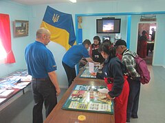 Tourists visit the post office inside Vernadsky Station