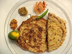 Wheat batter dosa, known locally as Godi mau or Godhumai mavvu dosa