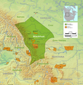 Traditional territory in green, reserves and reservations in orange.