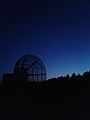 10-m radio telescope with Venus and Jupiter in the sky.