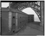 A general view of the northwest wall, in relation to the Fort Point arch of the golden gate bridge.