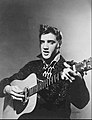 Image 18Elvis Presley in 1956, a leading figure of rock and roll and rockabilly. (from 20th century)