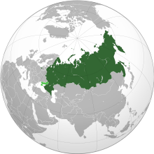 Русија (темнозелено) оспоерени територии под руска власт (светлозелена)