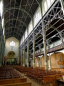 La iglesia de Notre-Dame-du-Travail, construida para los obreros de la Exposición Universal de 1900 (1897–1902).