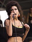 Amy Winehouse, cantante británica nacida un 14 de septiembre.