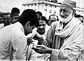 Karunanidhi overlooks as Dilip Kumar greets Khan Abdul Ghaffar Khan at Meenambakkam Airport, Chennai (c. 1960). Kumar was the only Indian recipient of Pakistan's highest civilian award, Nishan-e-Imtiaz.[3]