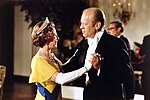 Elizabeth II wearing the Kokoshnik Tiara while dancing with President Ford at the White House in 1976.