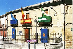 El Ayuntamiento, a historic stone building in Rus.