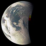 A color view of Earth assembled from 82 images as the spacecraft spun, at an altitude of 1,987 miles (3,197 kilometers), 10 minutes before closest approach