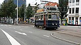 Motorwagen NZH A327 net over de brug van het Spui naar het Zieken in Den Haag. 14 augustus 2011.