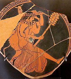 Maenad carrying a hind, fragment of an Attic red figure cup ca. 480 BC, Louvre Museum.