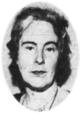A black-and-white photograph of a woman's head