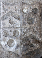 Ledger stone of Gertrude Courtenay (1592-1666), heiress of Upcott, wife of John I Moore (1582-1641), in St Matthew's Church, Cheriton Fitzpaine, with detail of escutcheon right showing arms of Moore quartering Courtenay, the latter with a crescent for difference