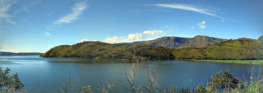 A panoramic partial view of Toba Lake, as seen from the west side to the southeast