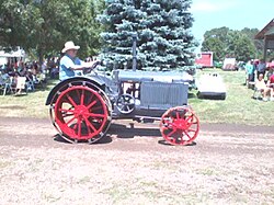 Antique tractor in the parade at the Granite Threshing Bee