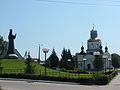 Свято-Дмитриевская церковь и памятник Святому Дмитрию Ростовскому на площади возле автовокзала