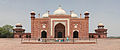 Image 5 Taj Mahal Mosque Photo: Muhammad Mahdi Karim The mosque at the Taj Mahal complex in Agra, India. This red sandstone building, on the western side of the complex, faces the west side of the mausoleum. In the forefront is a howz, meant for ablution. On the eastern side of the complex is the jawab ("answer"), a mirror image of the mosque except for the missing mihrab and different floor pattern; this jawab was mainly intended for architectural balance. Both were constructed in 1643. More selected pictures