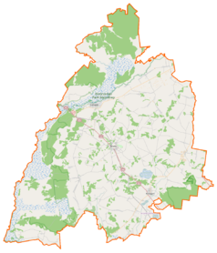 Mapa konturowa powiatu monieckiego, blisko centrum na lewo znajduje się punkt z opisem „Downary”
