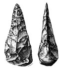 אבן יד דו-פנית (שני הטלים) באורך 20 ס"מ מסן-אשל, צרפת
