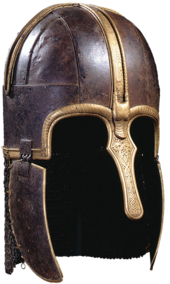 Helmet consisting of an iron skull cap with brass edging and decorations, two iron cheek guards with brass edging, and a neck guard