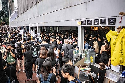 Many showed up to pay respects outside Pacific Place