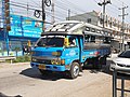 Image 206Medium-sized Isuzu Songthaew (truck bus) as seen in Samut Sakhon, Thailand. (from Combination bus)