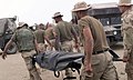 US soldiers carrying the body of a soldier