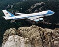 Image 6Air Force One, a Boeing VC-25, flying over Mount Rushmore. Boeing is a major aerospace and defense corporation, originally founded by William E. Boeing in Seattle, Washington.