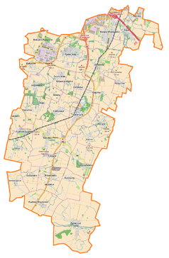 Mapa konturowa gminy Kobierzyce, blisko centrum u góry znajduje się punkt z opisem „AB Spółka Akcyjna”