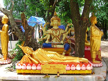 Statue of Mahabrahma in a Laotian Buddhist temple.