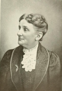 Portrait photograph of middle-aged white woman.
