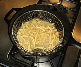 French fries being deep fried