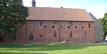 Vadstena kungsgård, ursprungligen kungligt lustslott uppfört i mitten av 1200-talet. Det blev en del av Vadstena kloster.