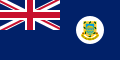 العلم الاستعماري لتوفالو ، وعليه شعار النبالة