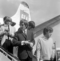 The Rolling Stones in Amsterdam, Schiphol. Brian is links zichtbaar.