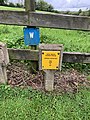 Marker posts for the Aquarius line water main near Ballynahinch.