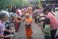 Image 67Buddhist novices receiving joss sticks. (from Culture of Thailand)