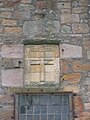 An ornate carved cross on the 17th century transept.