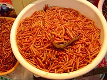 A dish of roasted chinicuiles in a market in Tula, Hidalgo, México
