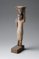 Statuetta di portatrice. Tra il 1980 e il 1700 a.C., Medio Regno. Museo Egizio, Torino.