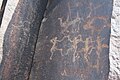 Petroglyphs প্রাচীন উপজাতীয় নৃত্য ও প্রাণী