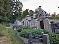 Sachgesamtheit Georgenfriedhof: drei Grabanlagen, ein Grabmal, Ehrenmal für gefallene Sowjetsoldaten, Soldatengrabanlage für gefallene deutsche Soldaten im Zweiten Weltkrieg und Einfriedung