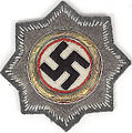 ドイツ十字章金章の戦闘服用布製略章。